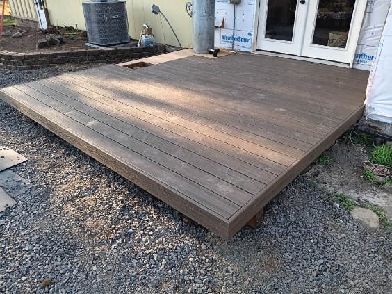 Ground-level composite deck built in Corvallis, Oregon by David Culbertson's 360 Custom Construction, vetted by On Top Home Services