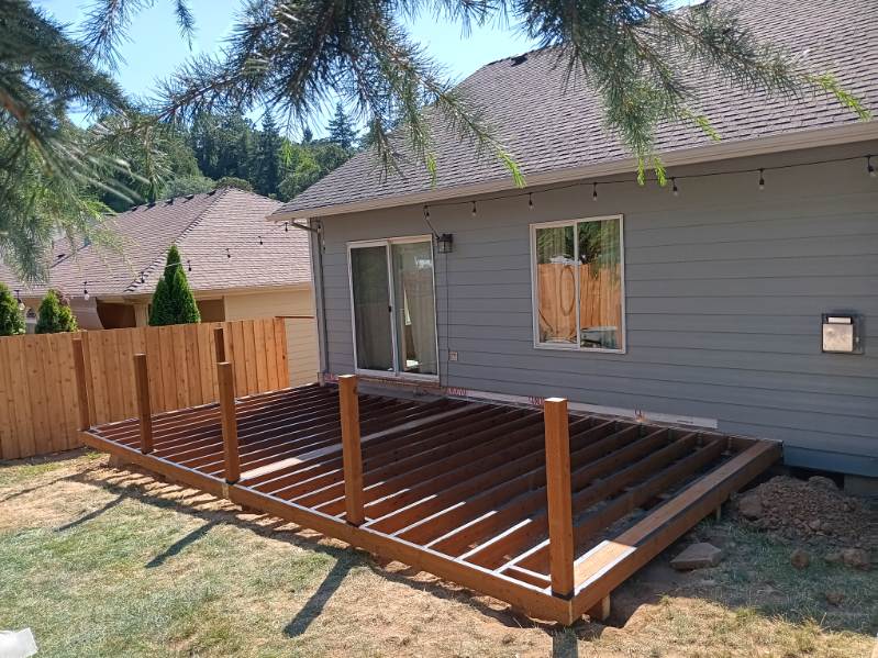 Deck floor-joist framing during construction in Lebanon, Oregon by 360 Custom Construction, vetted by On Top Home Services