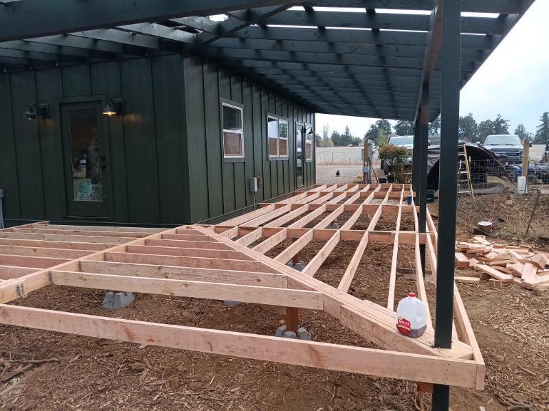 Deck floor-joist framing showing moisture detailing in Tigard, Oregon by 360 Custom Construction, vetted by On Top Home Services