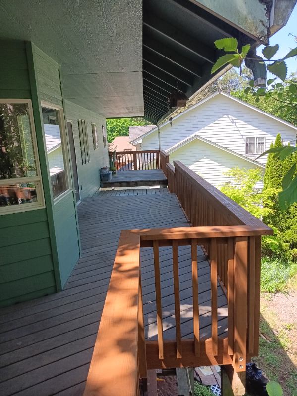 Elevated composite side deck with cedar railing built in Willamina, Oregon by 360 Custom Construction, vetted by On Top Home Services