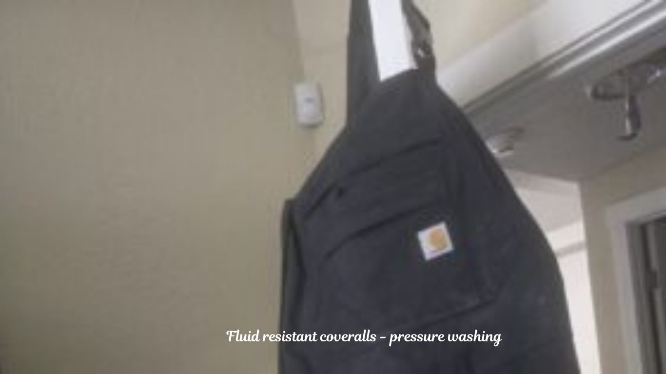 Fluid resistant coveralls - pressure washing
